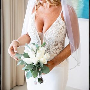 Justin Alexanderer , ivory weddings gown